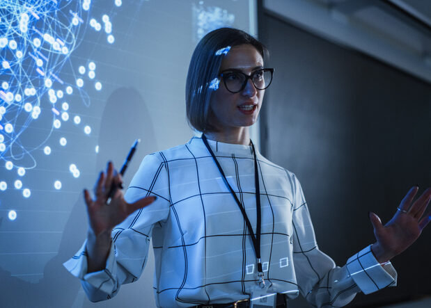 county college of morris | woman standing in front of a projector with data science in the background